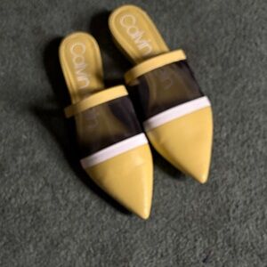 Calvin Klein Yellow and Black Mules
